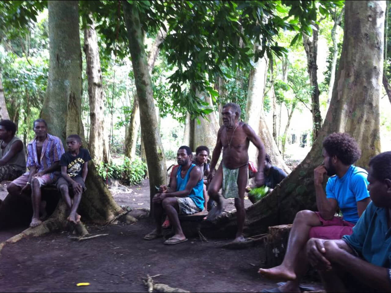 Friends In Action International - People listening to preaching