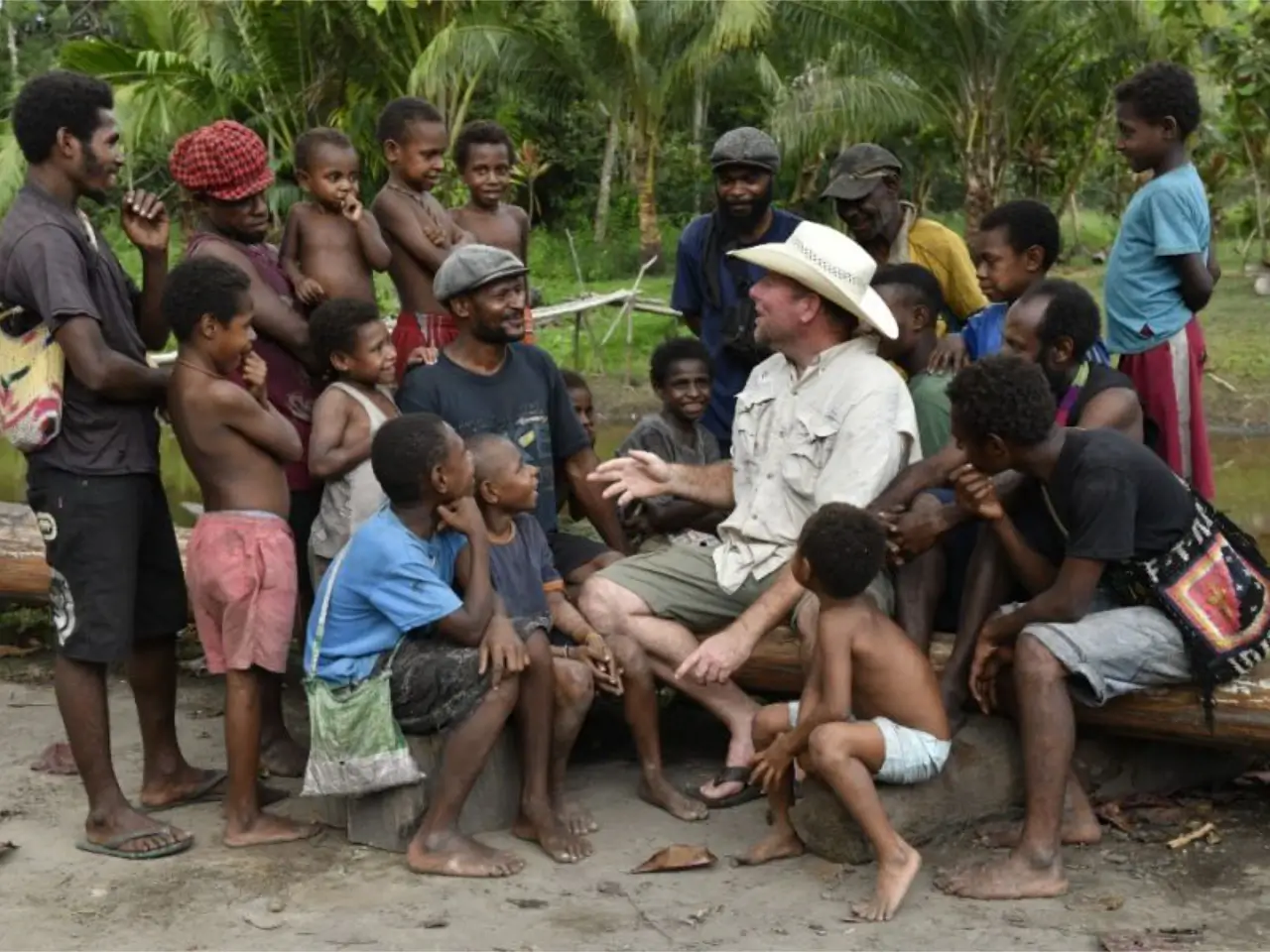 children gathered around hearing stories