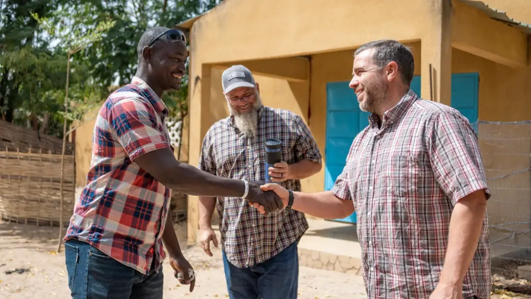 community-members-field-leaders A community member, Jeremy and Matt (FIA West Africa Field Leader)