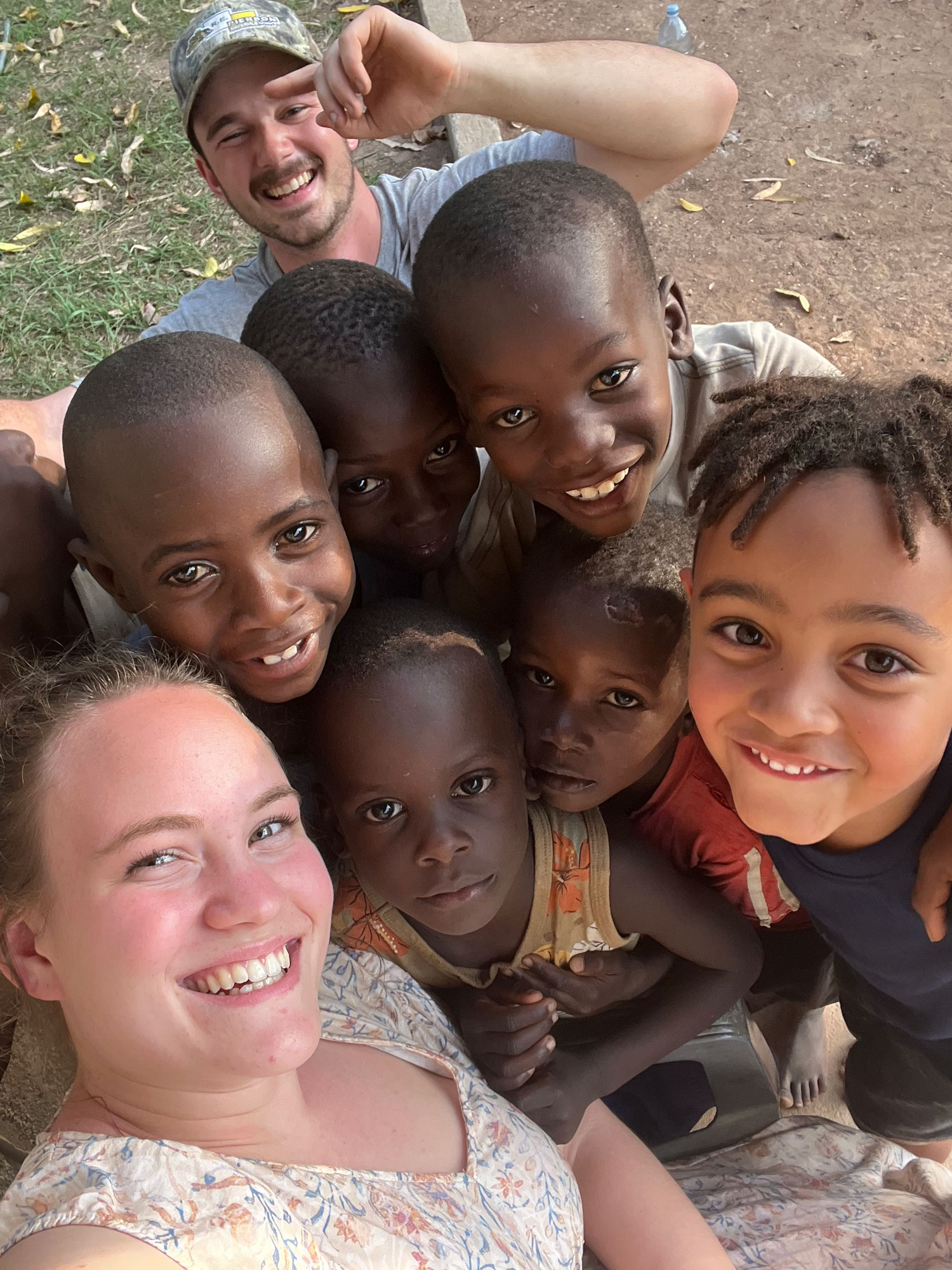 Reagan (left) and several Ugandan children.